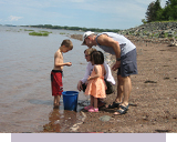 Family fun on the beach. Rent an oceanfront cabin in Nova Scotia for the whole family.